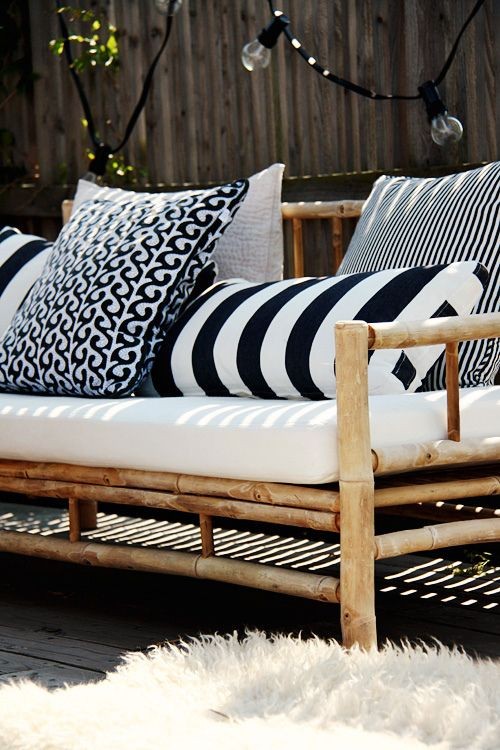 Chic outdoor living space. Bamboo frame for sofa c...