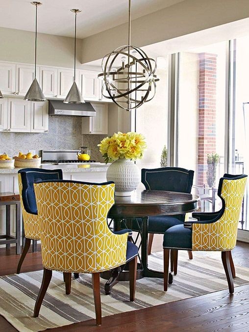 Love these chairs with the fun fabric on the back....