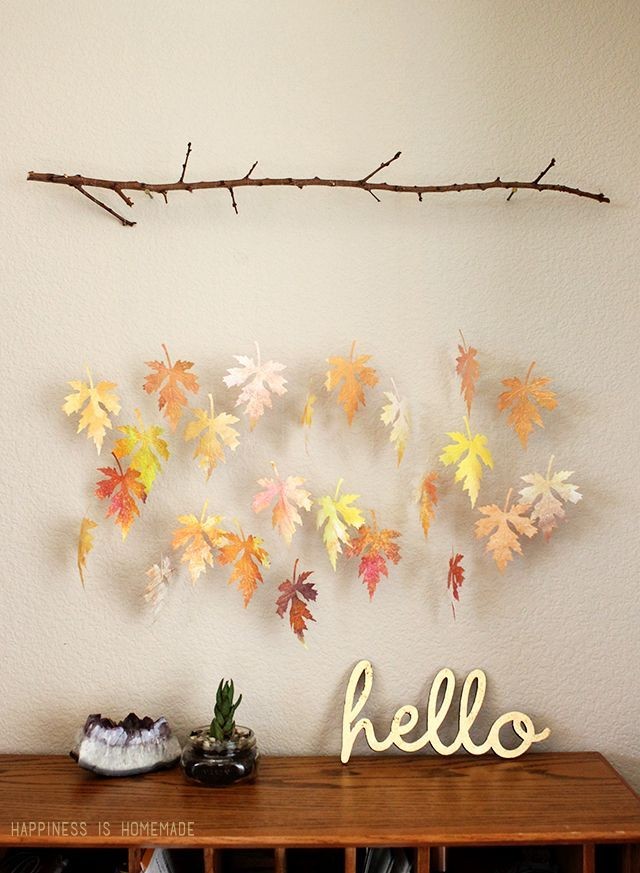 This watercolor leaf and branch mobile is totally...