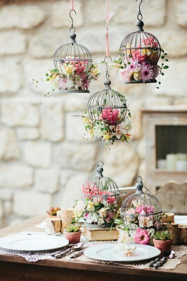 amazing decor idea: flowers in a birdcage!