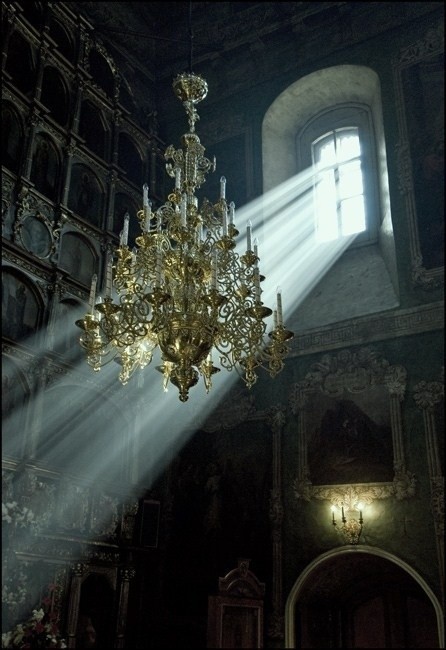 A gorgeous chandelier still hangs in an abandoned...