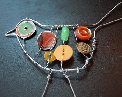 Make wire art with buttons. Fun idea for kids.