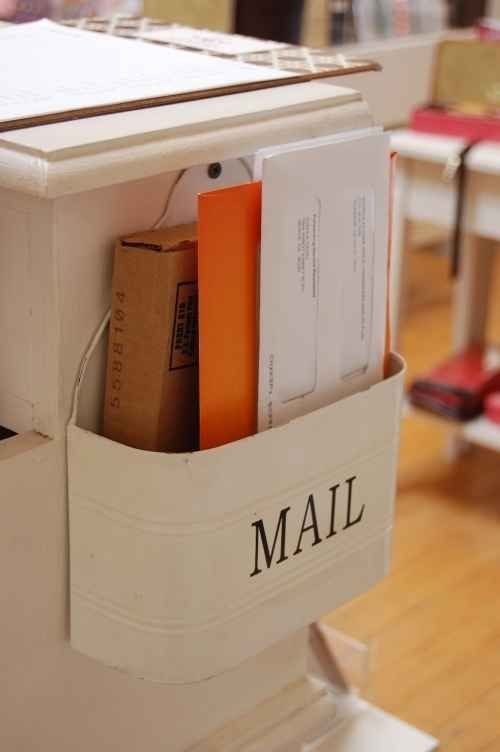 Hang your mail holder on the side of a table or ki...