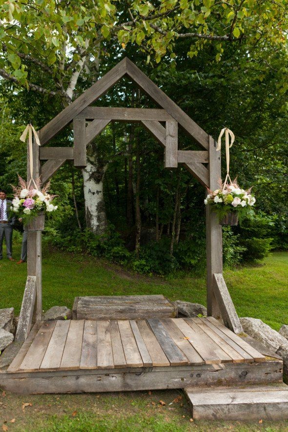 This is a charming arbor for a rustic country wedd...