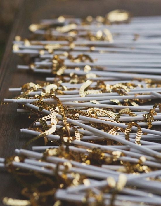 hand out gold sparkly sequin wands for guests inst...
