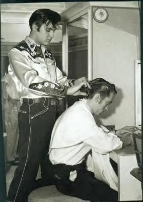 Elvis helping Johnny Cash with his hair - Iconic &...