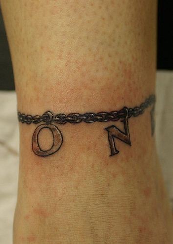 I love this tattoo!!! a charm bracelet and putting...