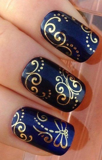 Intricate design - gold swirl on royal blue Discov...