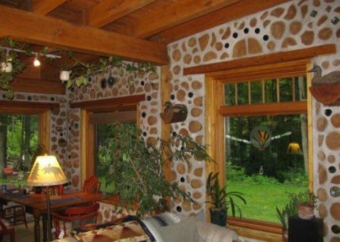 cordwood house. This is like a craftsman or arts &...