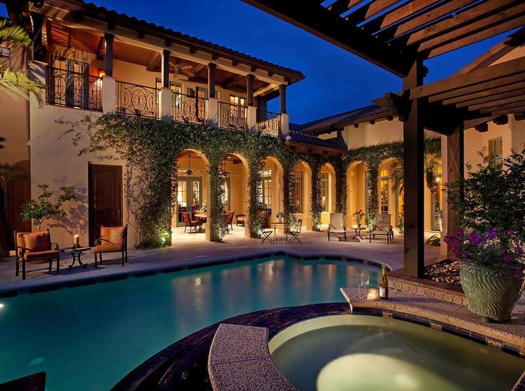 U-shape Spanish style home with courtyard pool......