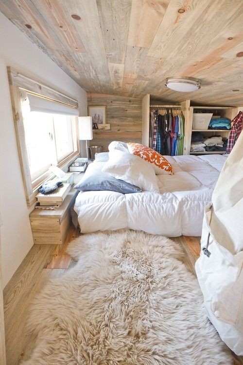 Bedroom loft in a tiny home. Love all the various...