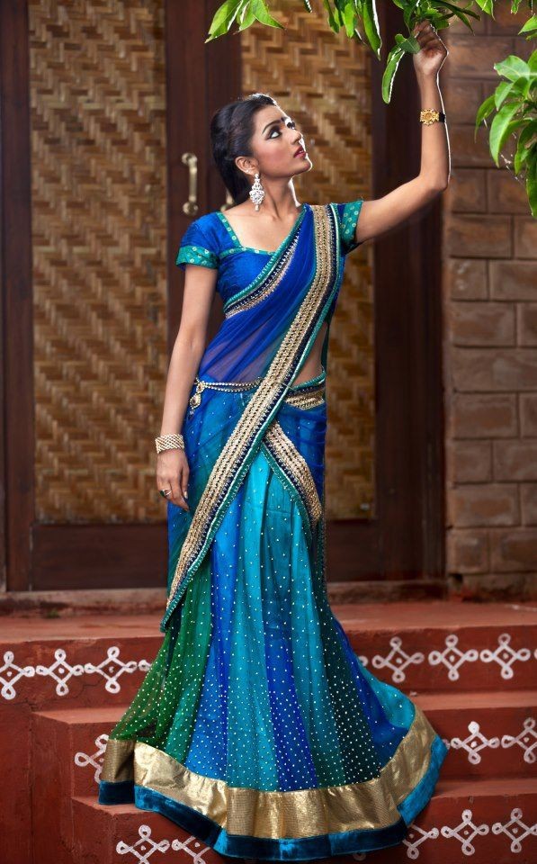Blue-green half saree. Indian fashion.