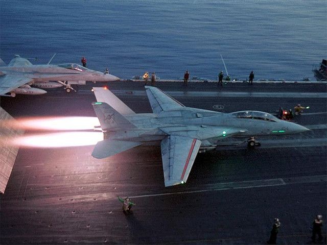 F-14 Tomcat using afterburners for take off. The o...
