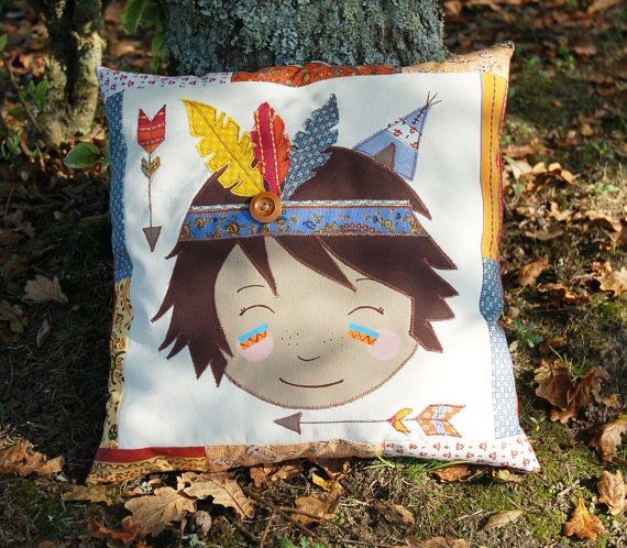 A nice cushion with a small Indian, feathers fabri...