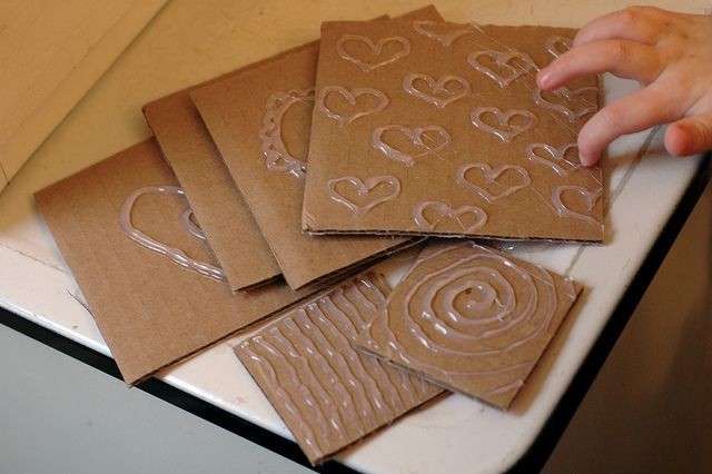 Hot glue rubbing plates. Make your design with hot...