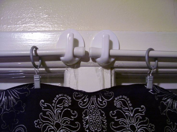 Hanging curtains with command strips, looks like a...