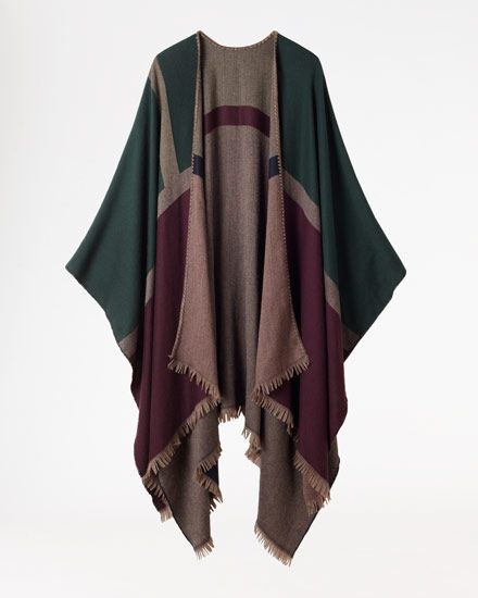 Italian-made statement poncho crafted in a luxe vi...