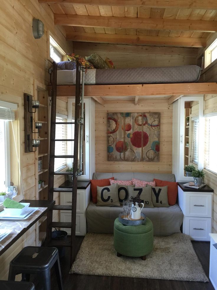 A tiny house on wheels with a total of 270 square...