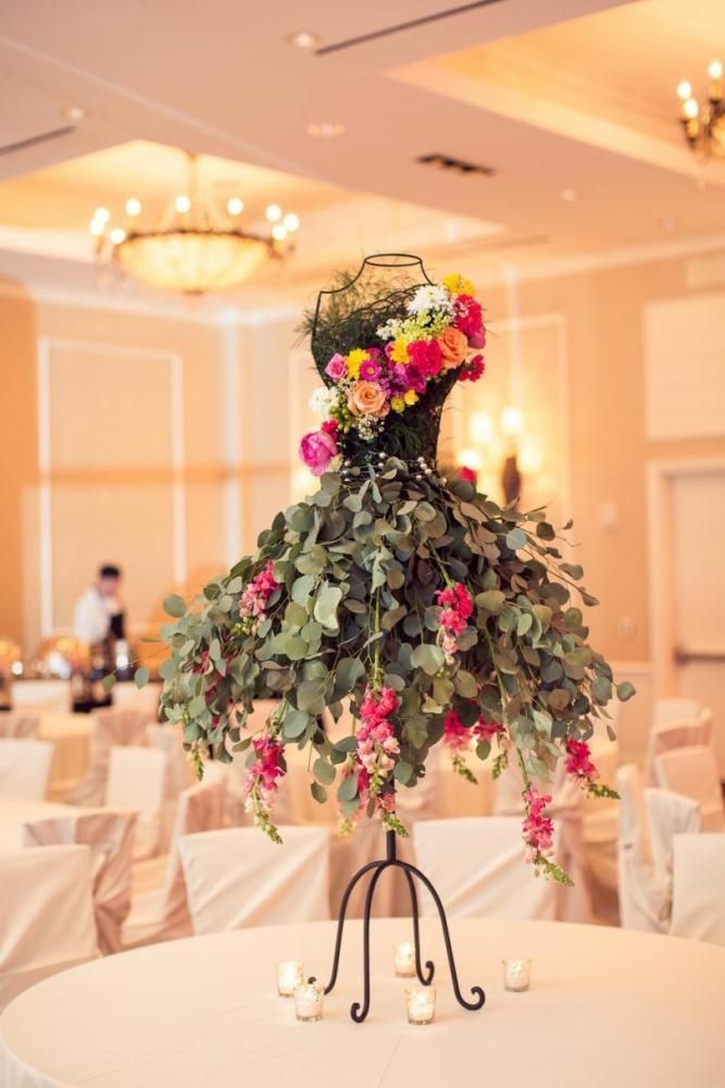 Fashion inspired centerpiece. Photo by Randy Colem...