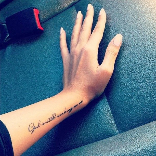 Quote tattoo on inner arm for girl - God Is Still...