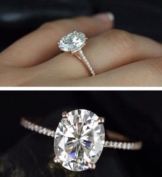 Oval engagement ring. Definitely doesn't need a ha...