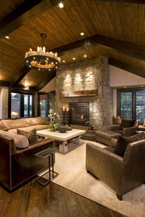 Living room. That Pottery Barn candle chandelier i...