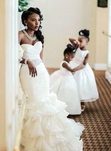 Our Maggie Bride Samira's vintage glam hair is the...