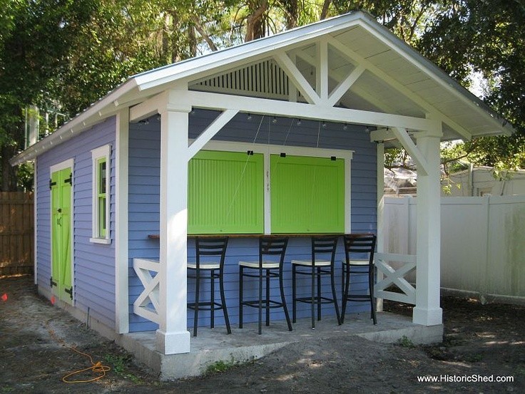 Custom shed / snack bar with a porch and bright gr...