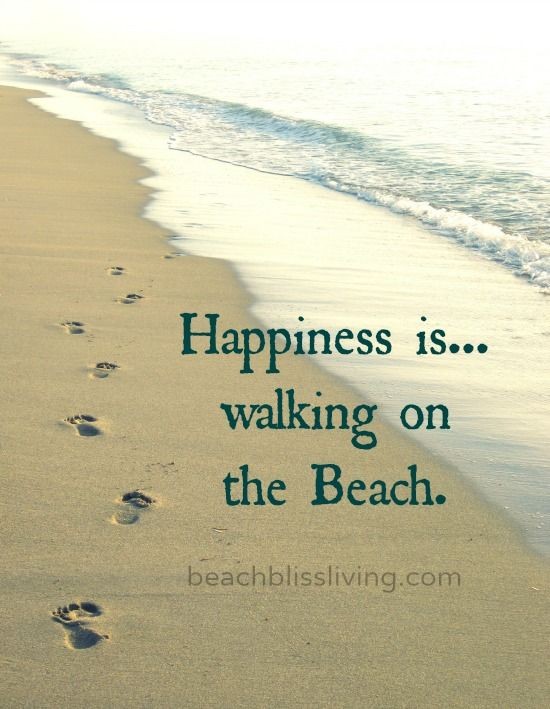 Footprints in the sand... walking barefoot on the...