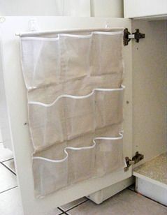 great storage idea for cleaners and maximizing spa...
