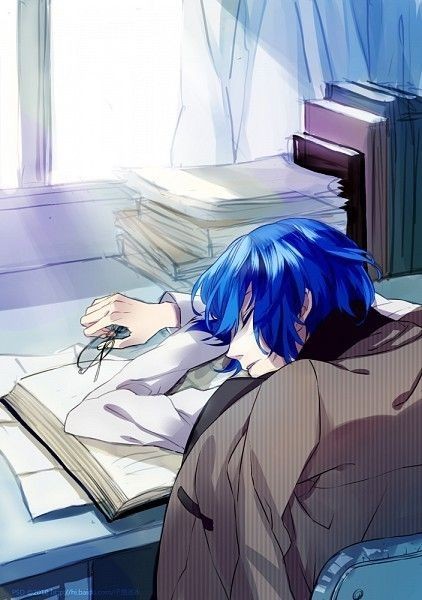 Anime guy fell asleep either doing his homework, s...
