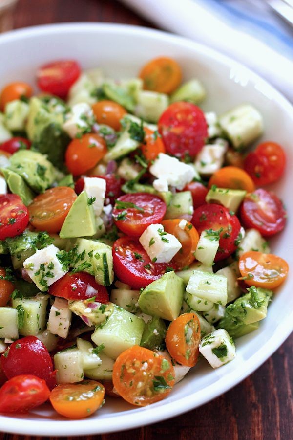 Tomato, cucumber, avocado salad. A cool and easy s...