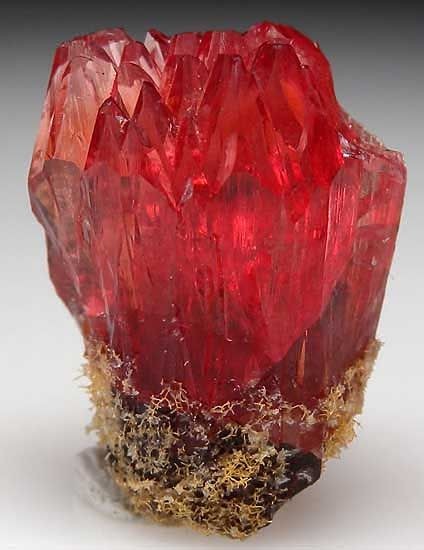 Rhodochrosite: Wearing or placing on or near the h...