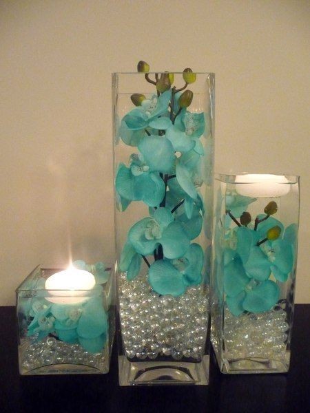 Tiffany blue orchids in water