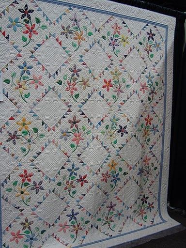 pretty quilt, lots of room for fun quilting.  Love...