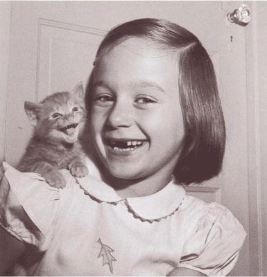 "A happy child and a happy cat" from buzz feed's 3...