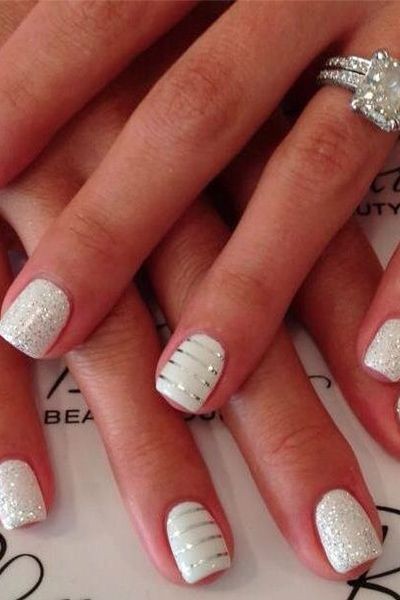 This subtle yet sparkly mani is so chic for a #bri...