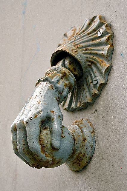 Knock, knock. What a beautiful antique figural doo...