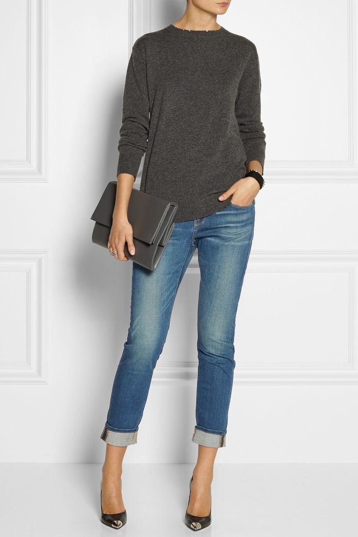 Grey sweater with rolled up cuff jeans paired with...