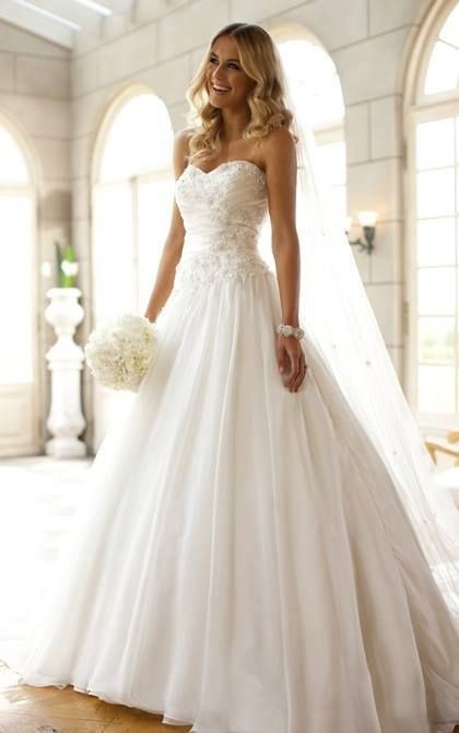 I love the shape of this dress! Not too much tulle...