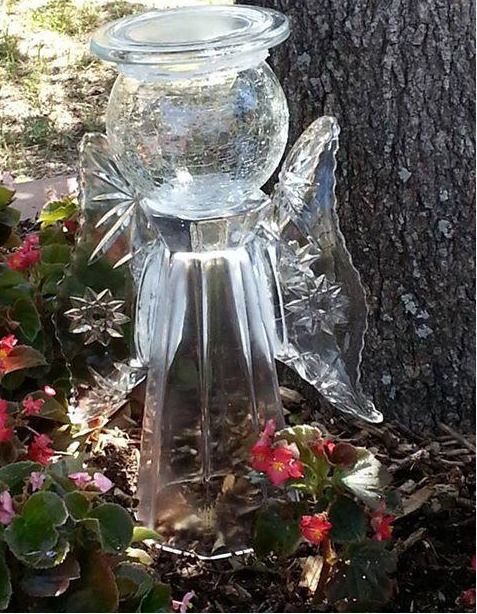 Garden angel with pickle dishes for wings.