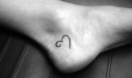 tiny heart foot tattoo