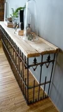 salvaged wood + wrought iron fence = console table