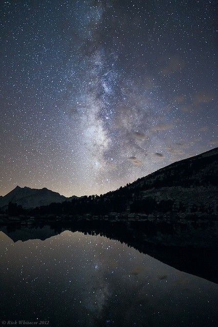 beautiful landscape! Many stars are reflected in t...
