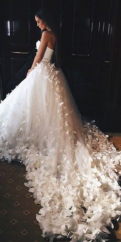 Wedding dresses are designed to make every bride l...