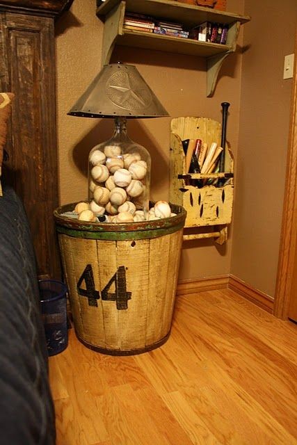 Love this baseball lamp/table and the bats on the...