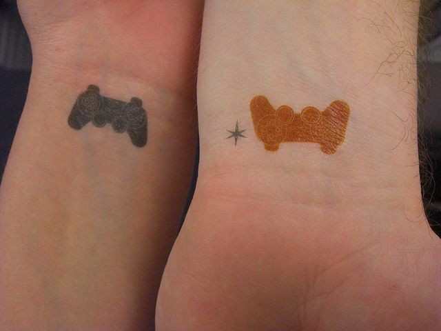 matching video game controller tattoos | couples t...
