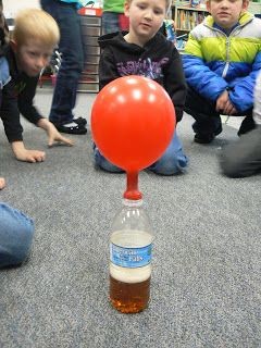 States of Matter: Baking Soda in a balloon, on top...