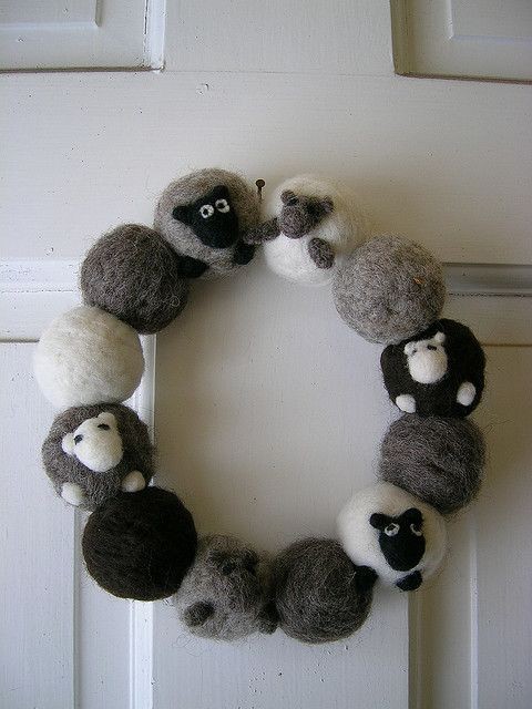 Felted sheep wreath.  I love this - good way to us...