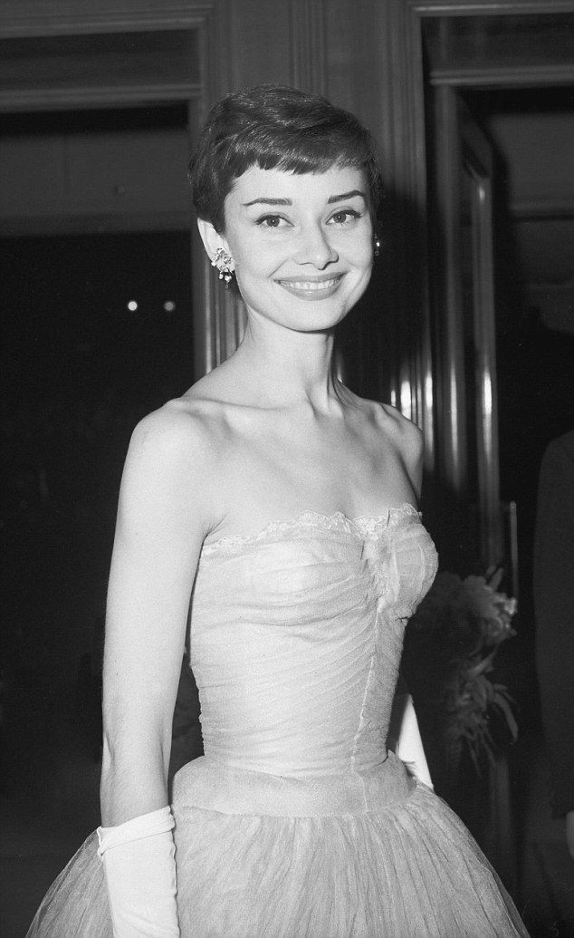 Audrey Hepburn at the London premiere of As Long A...